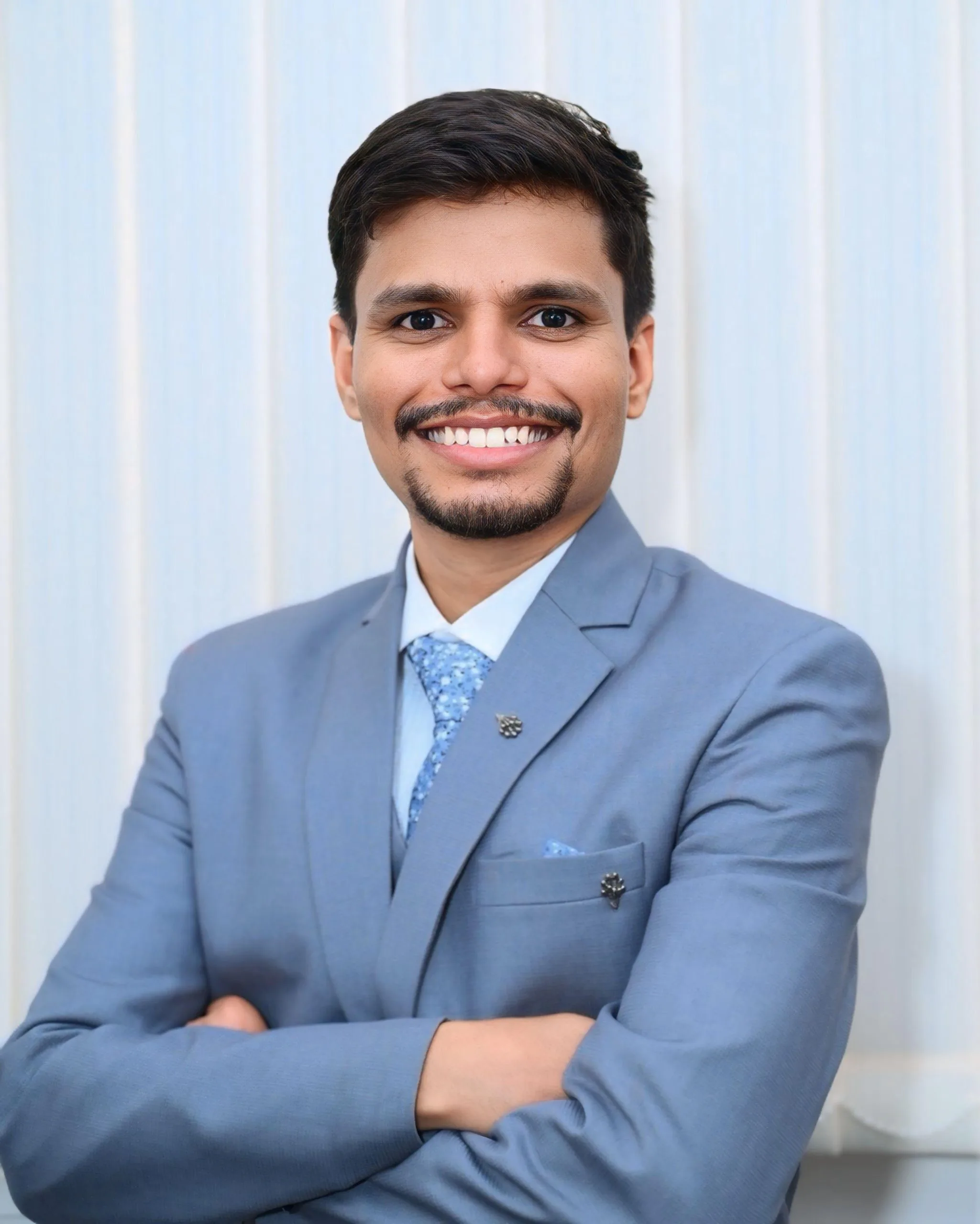 Dr. Adesh K